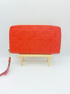 LOUIS VUITTON RED MONOGRAM EMPREINTE LEATHER ZIPPY