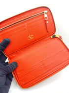 LOUIS VUITTON RED MONOGRAM EMPREINTE LEATHER ZIPPY